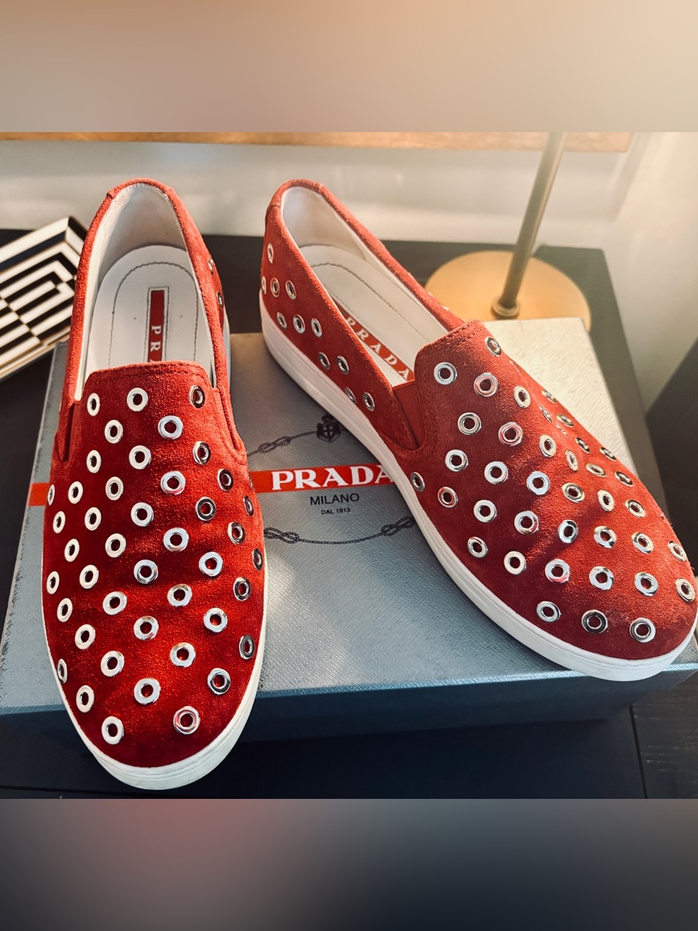 Prada Red Suede Slip-On Sneakers with Eyelet Detail